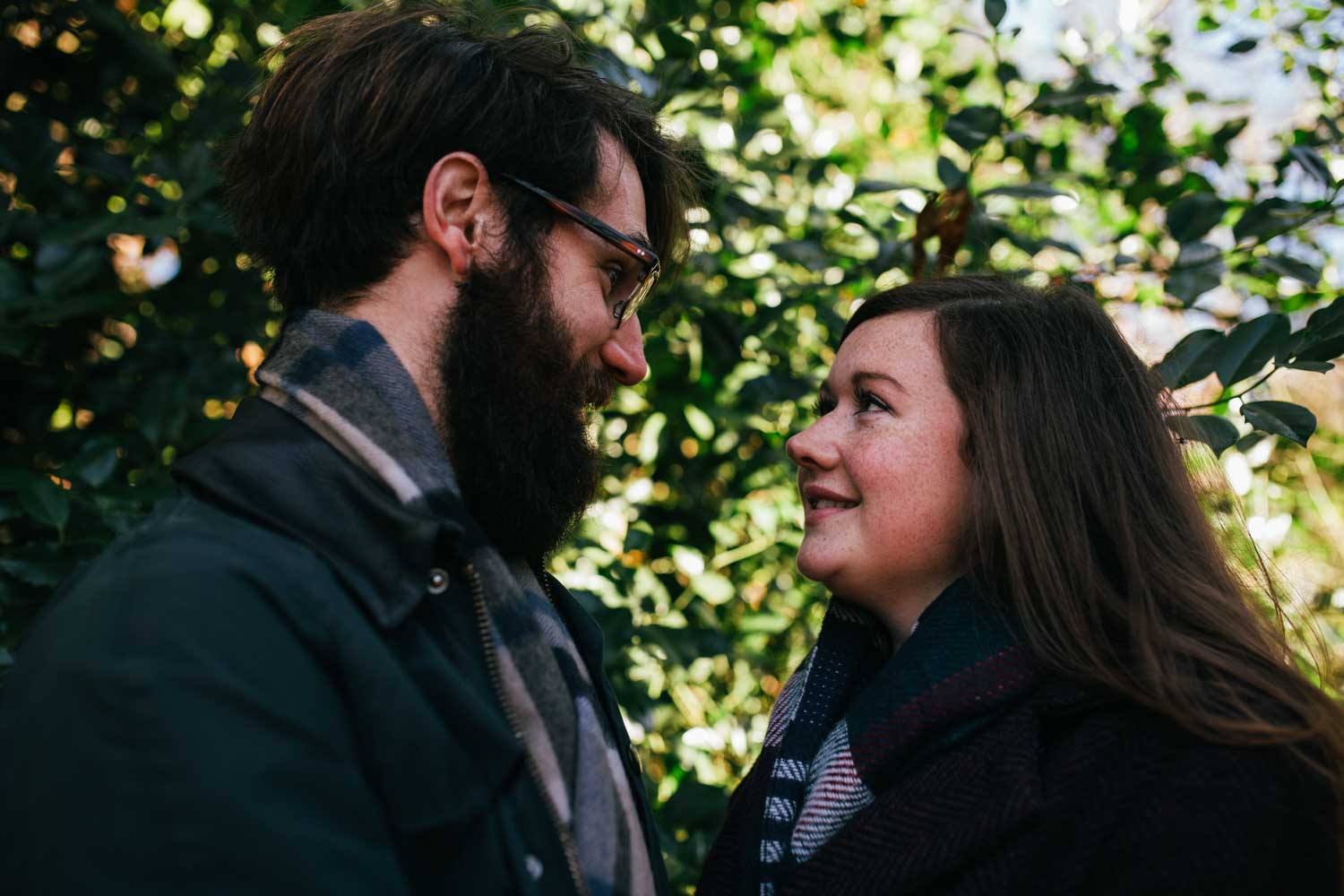 leafy backdrop for couples engagement shoot in suffolk