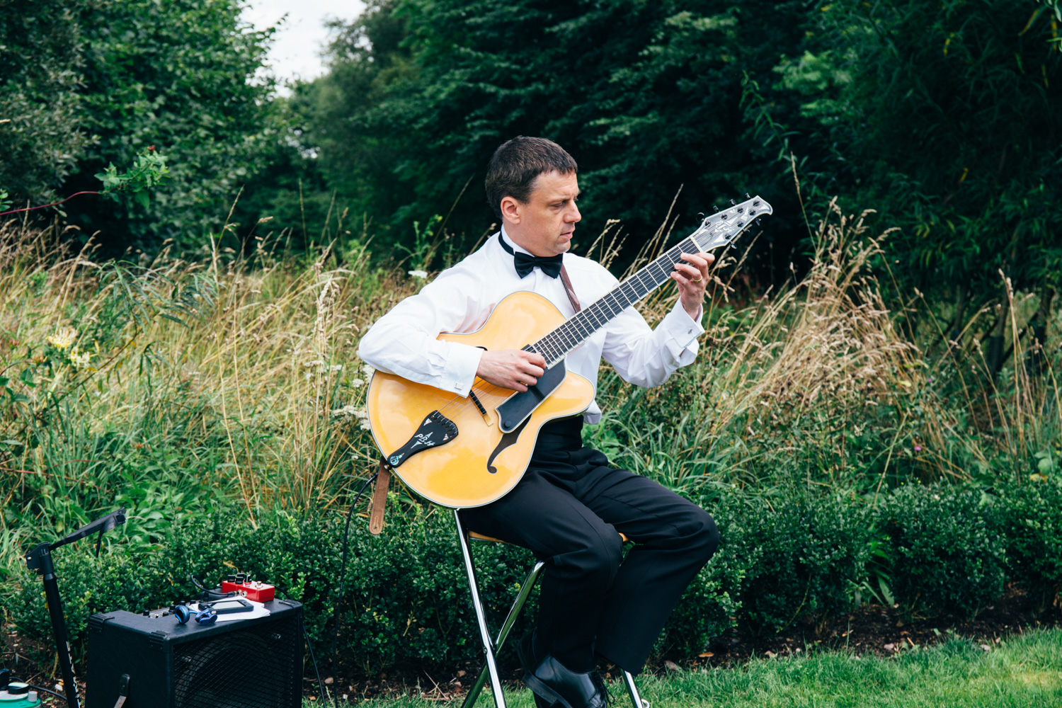 guitar player at outdoor ceremony