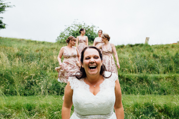 bride and bridesmaids laughing at the keeper and the dell