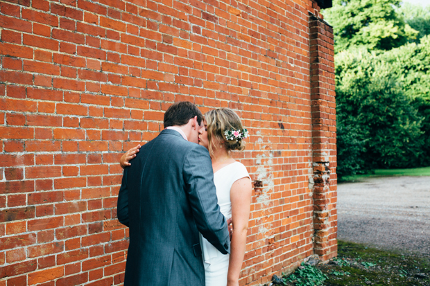 outside blackthorpe barn suffolk wedding photography of newlyweds