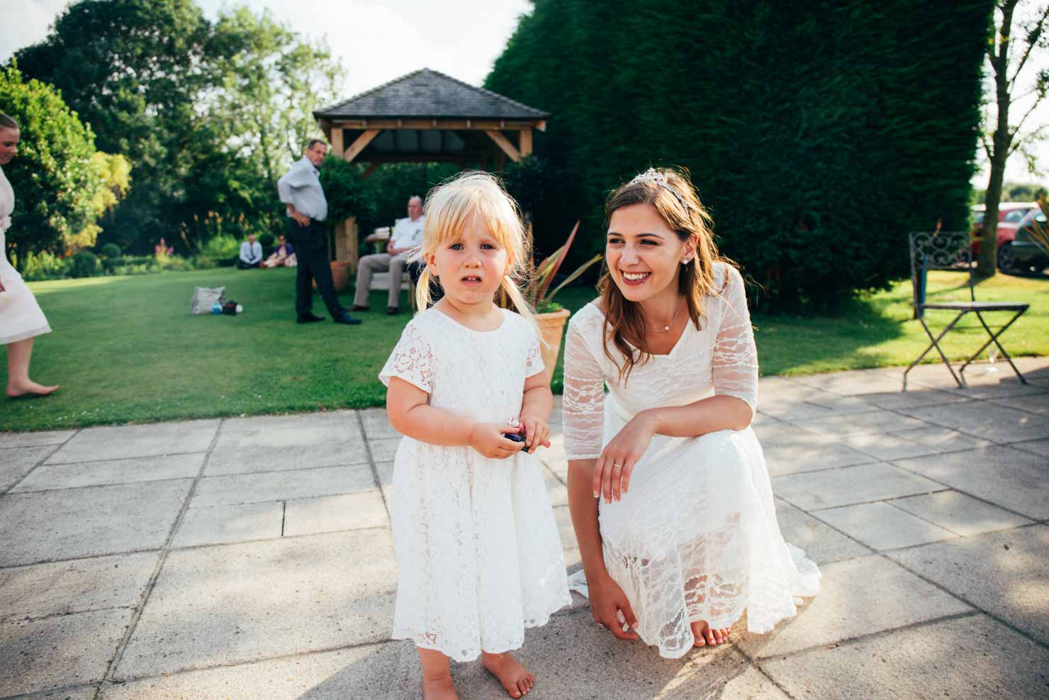 Elm Barn Wedding Photography of bride and daughter in Suffolk