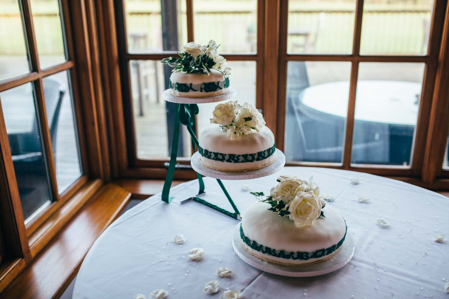 white and green wedding cake at hintlesham hall wedding reception