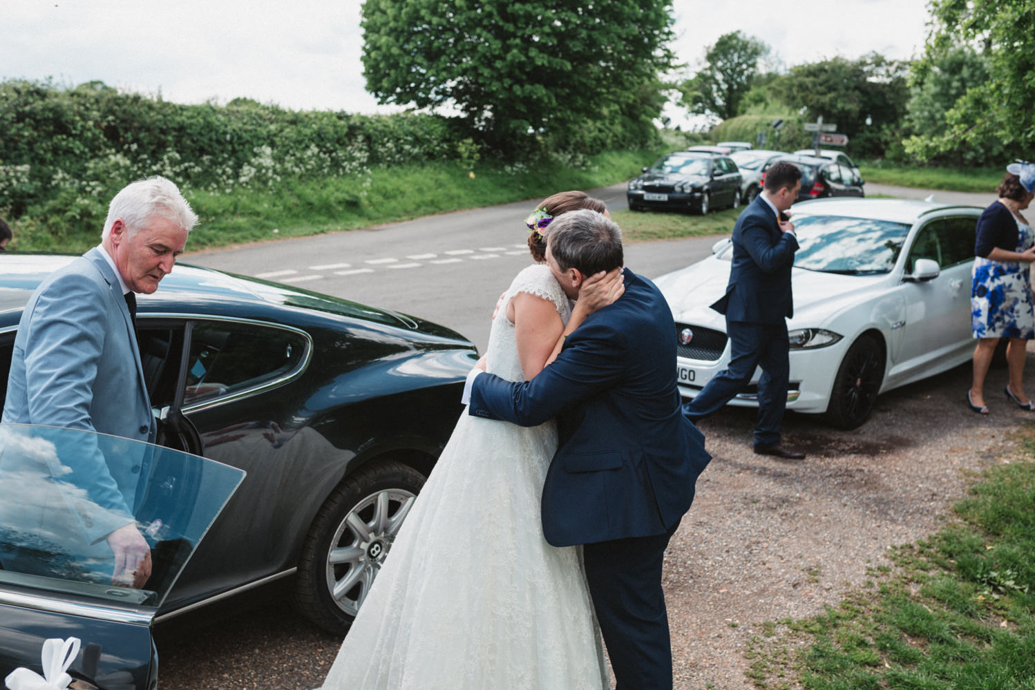 Norfolk bride hugs dad before wedding