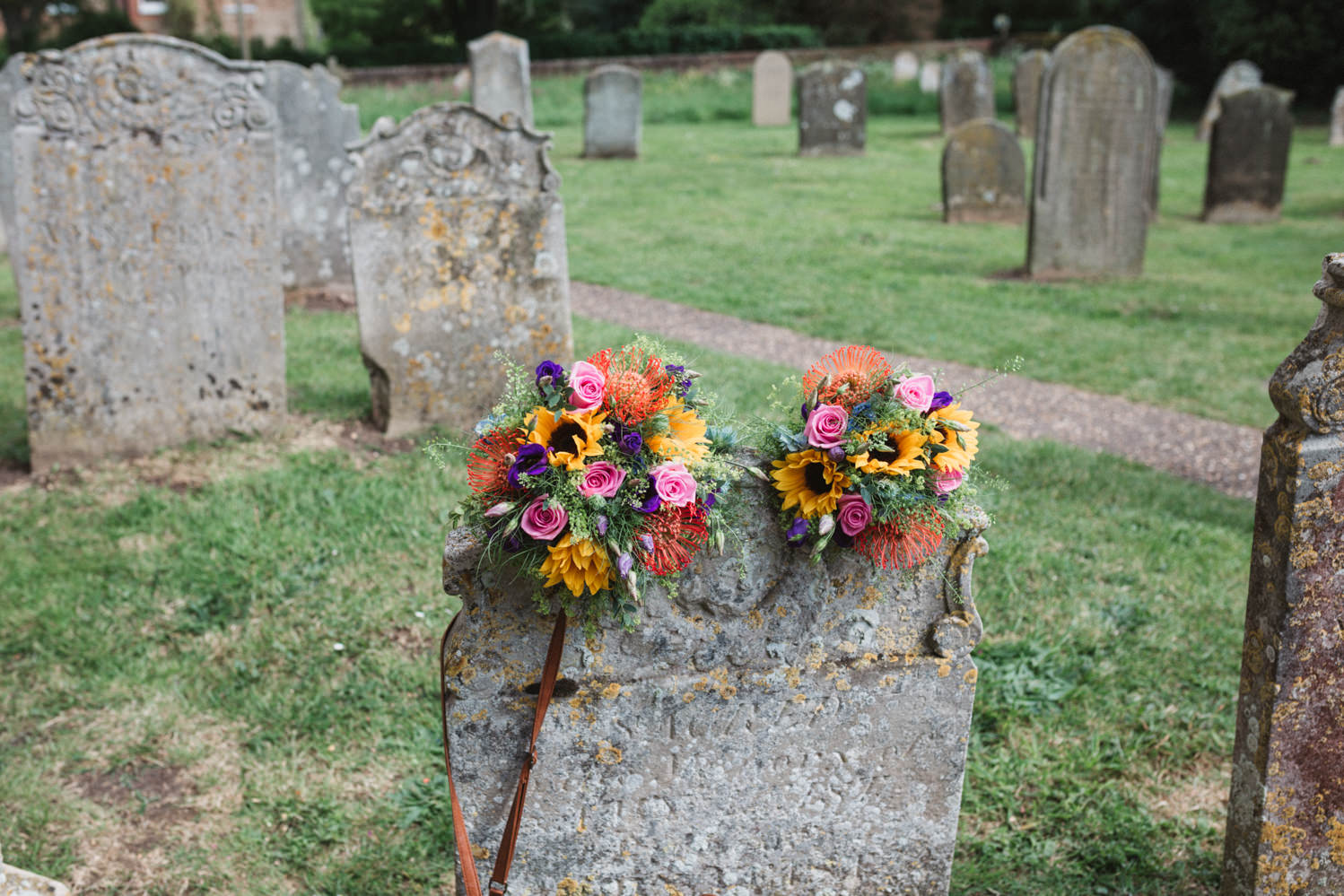 Norfolk wedding bouquets in church graveyard