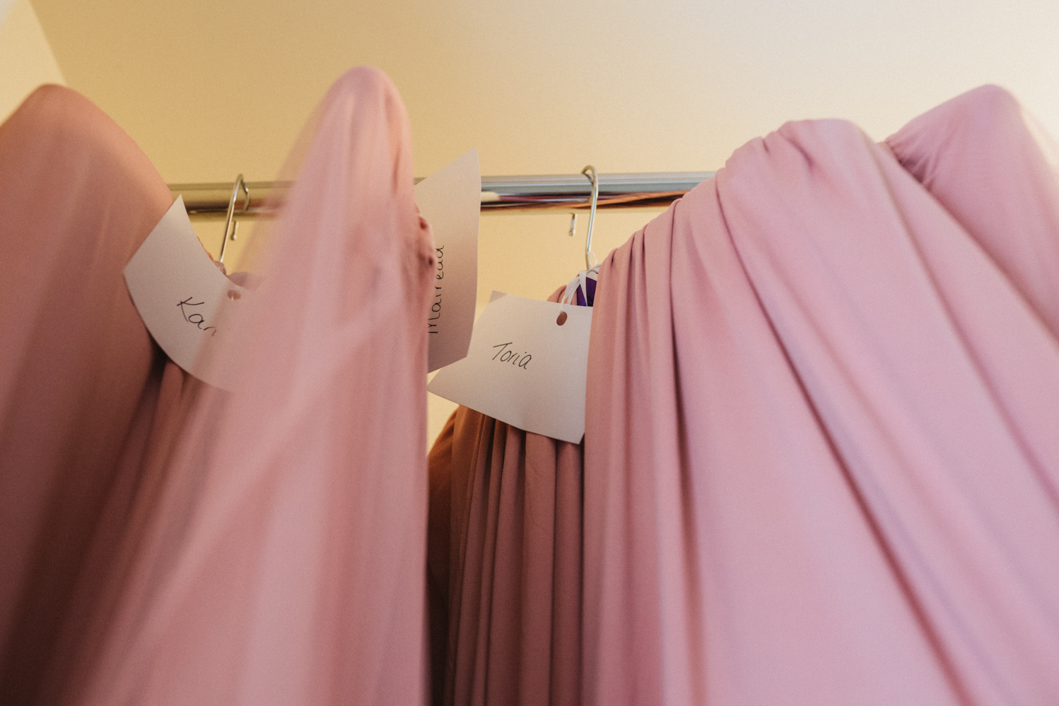 photography of pink bridesmaids dresses at a natural pretty elms barn wedding in suffolk