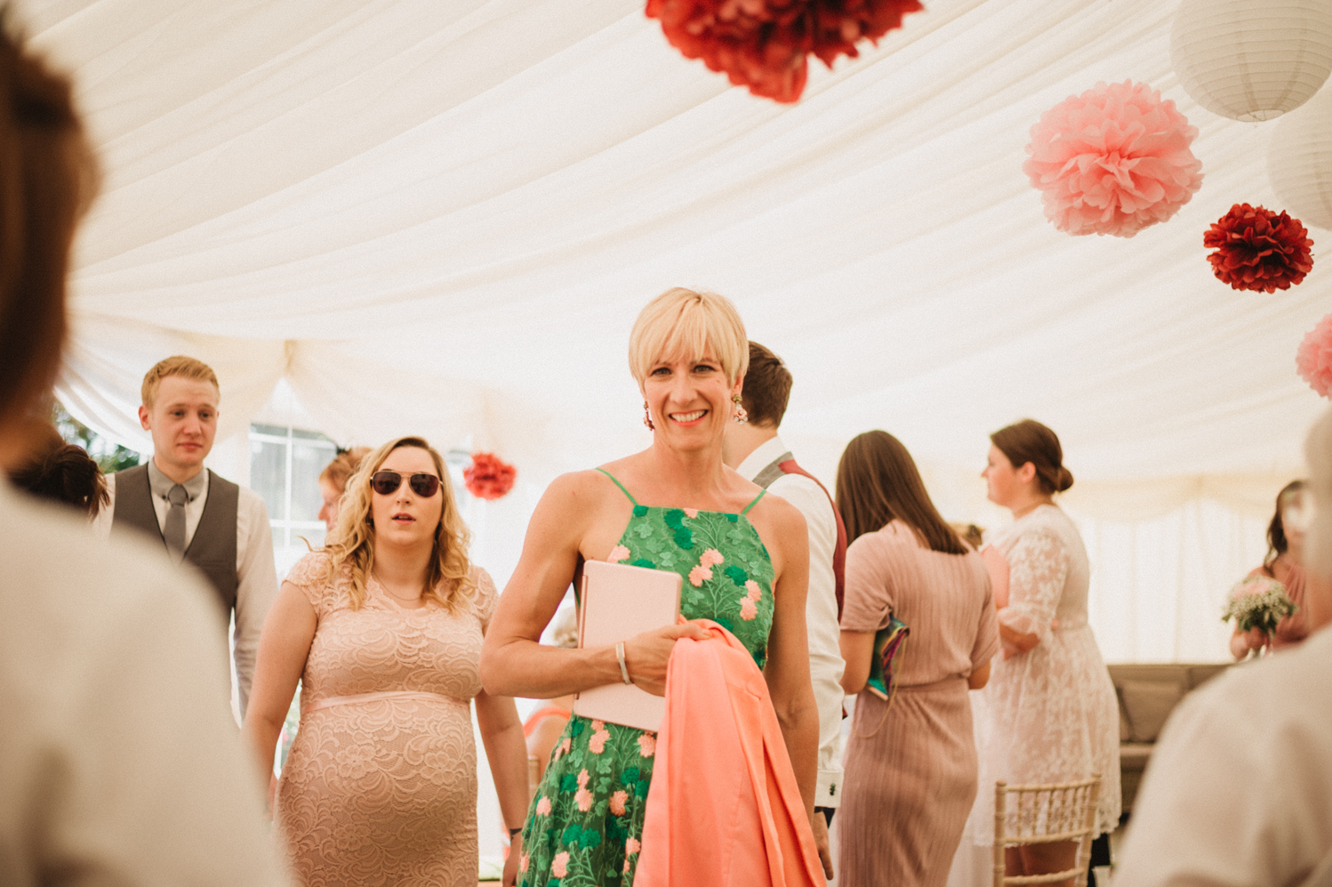 candid guests photography at a natural pretty elms barn wedding in suffolk 