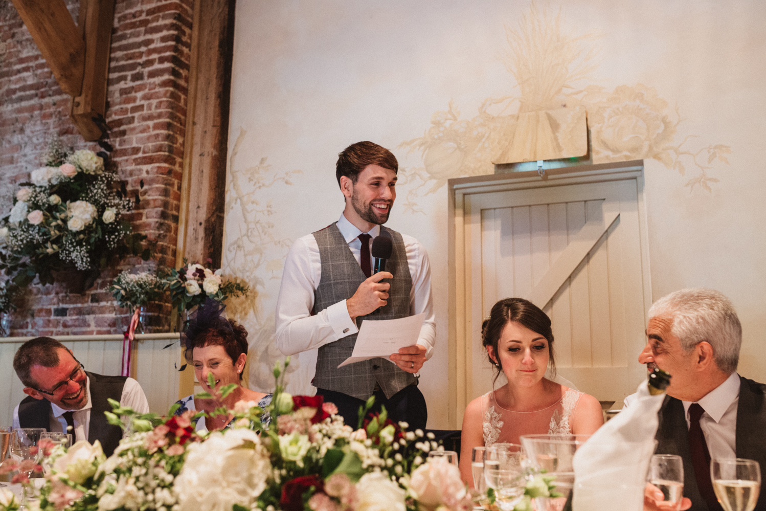 candid guests photography at a natural pretty elms barn wedding in suffolk