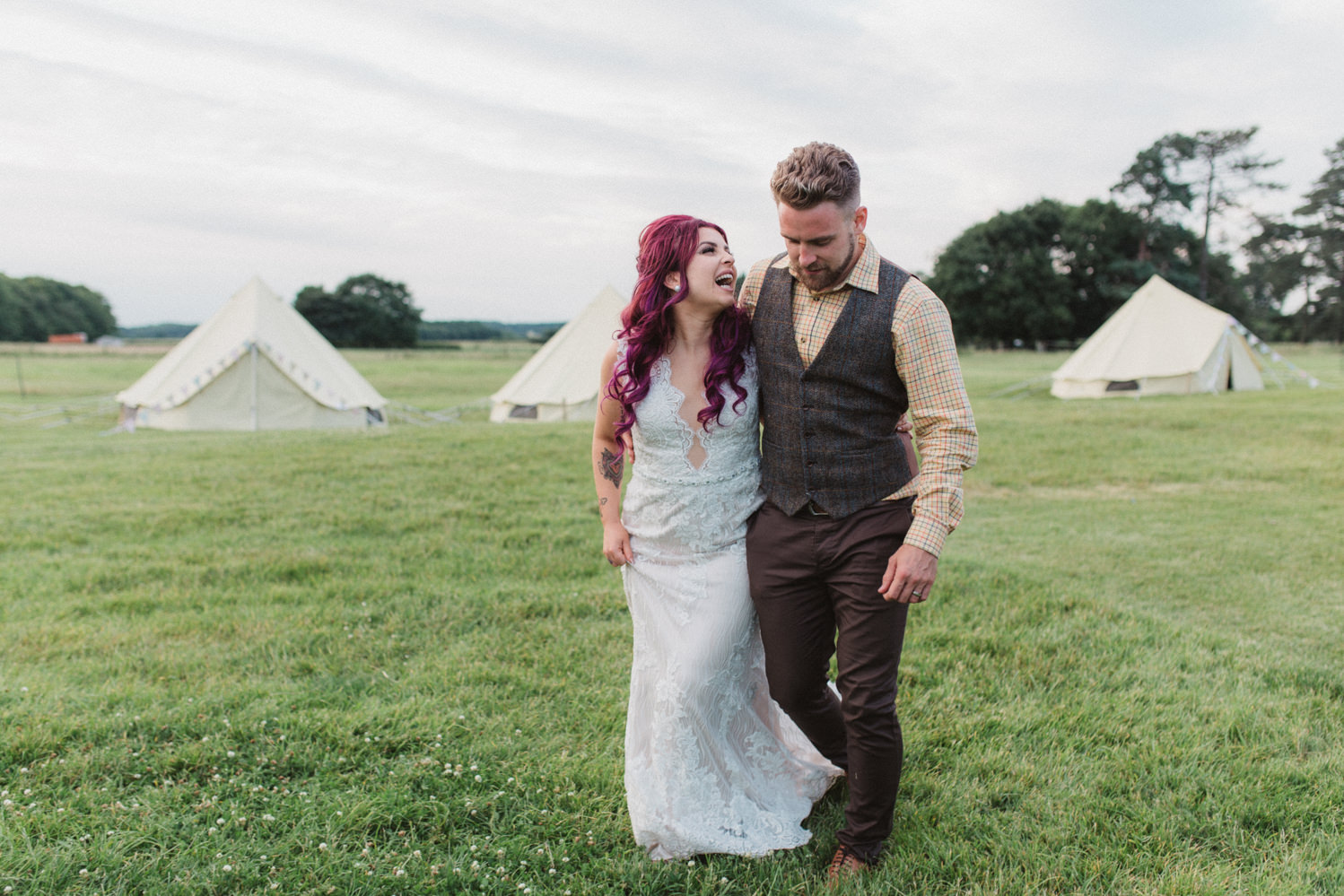 relaxed wedding photography at colourful festival wedding at godwick great barn norfolk