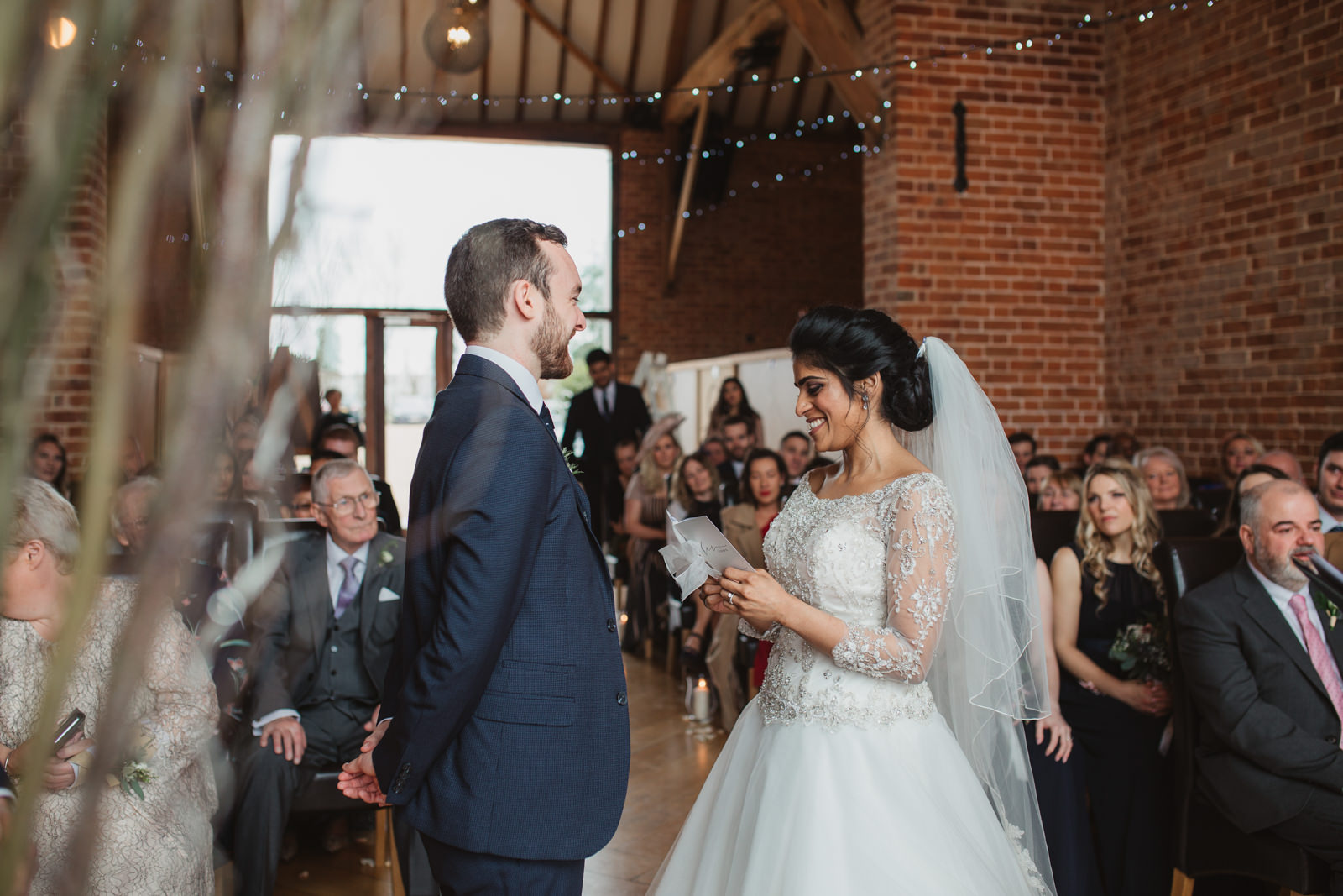 Newlyweds during ceremony at relaxed southwood hall wedding