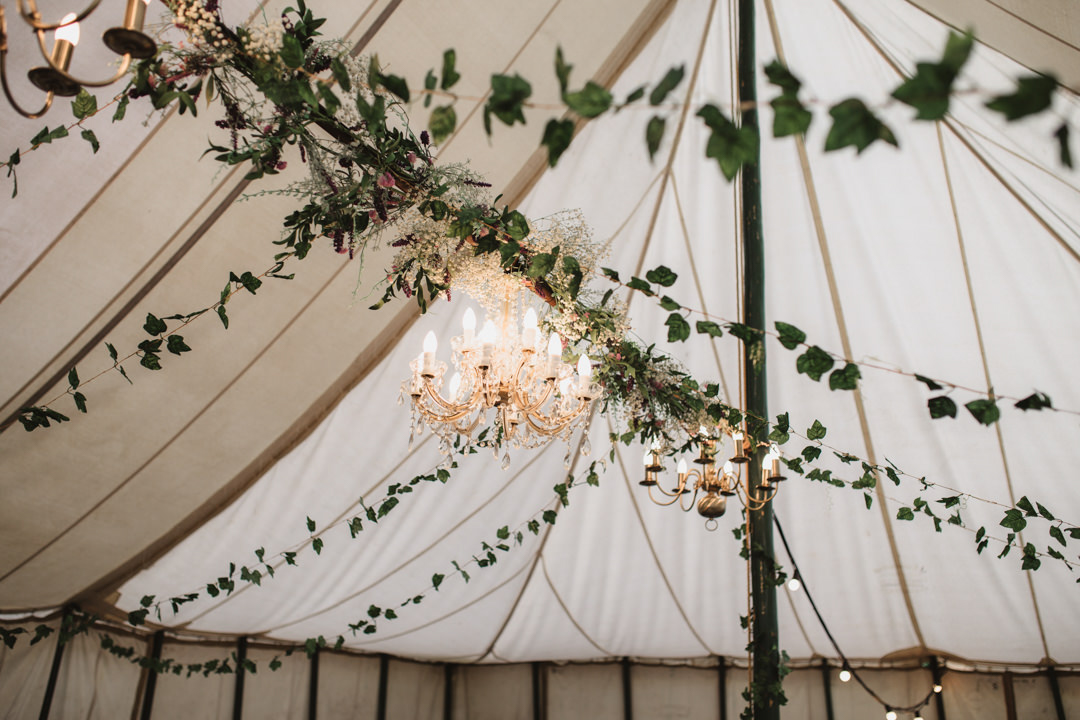 keeper and the dell vintage marquee decorated with ivy and gypsophila