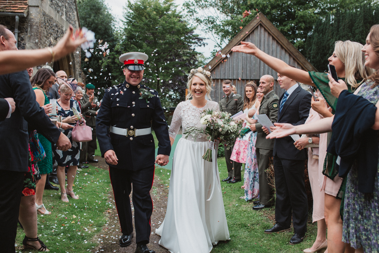 confetti pictures of military bride and groom in suffolk