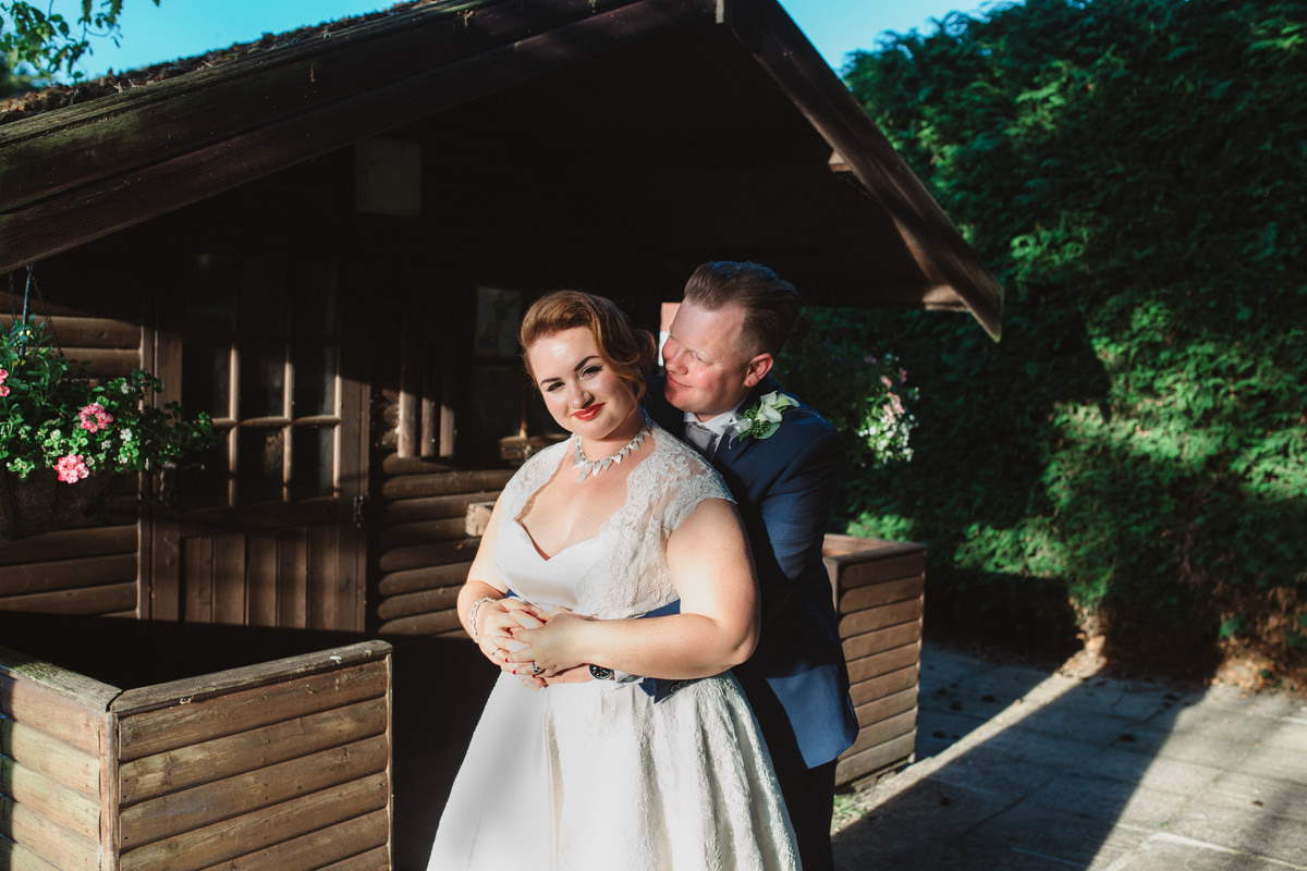 newlyweds in the sunshine at OLD RECTORY CROSTWICK WEDDING PHOTOGRAPHY