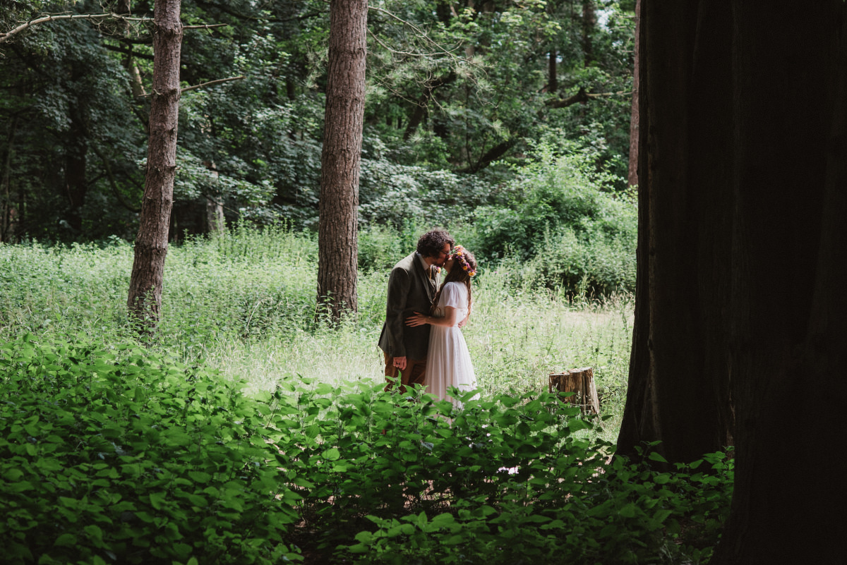 couple kissing at Oak Lodge Thetford Forest Wedding Photography Suffolk Norfolk