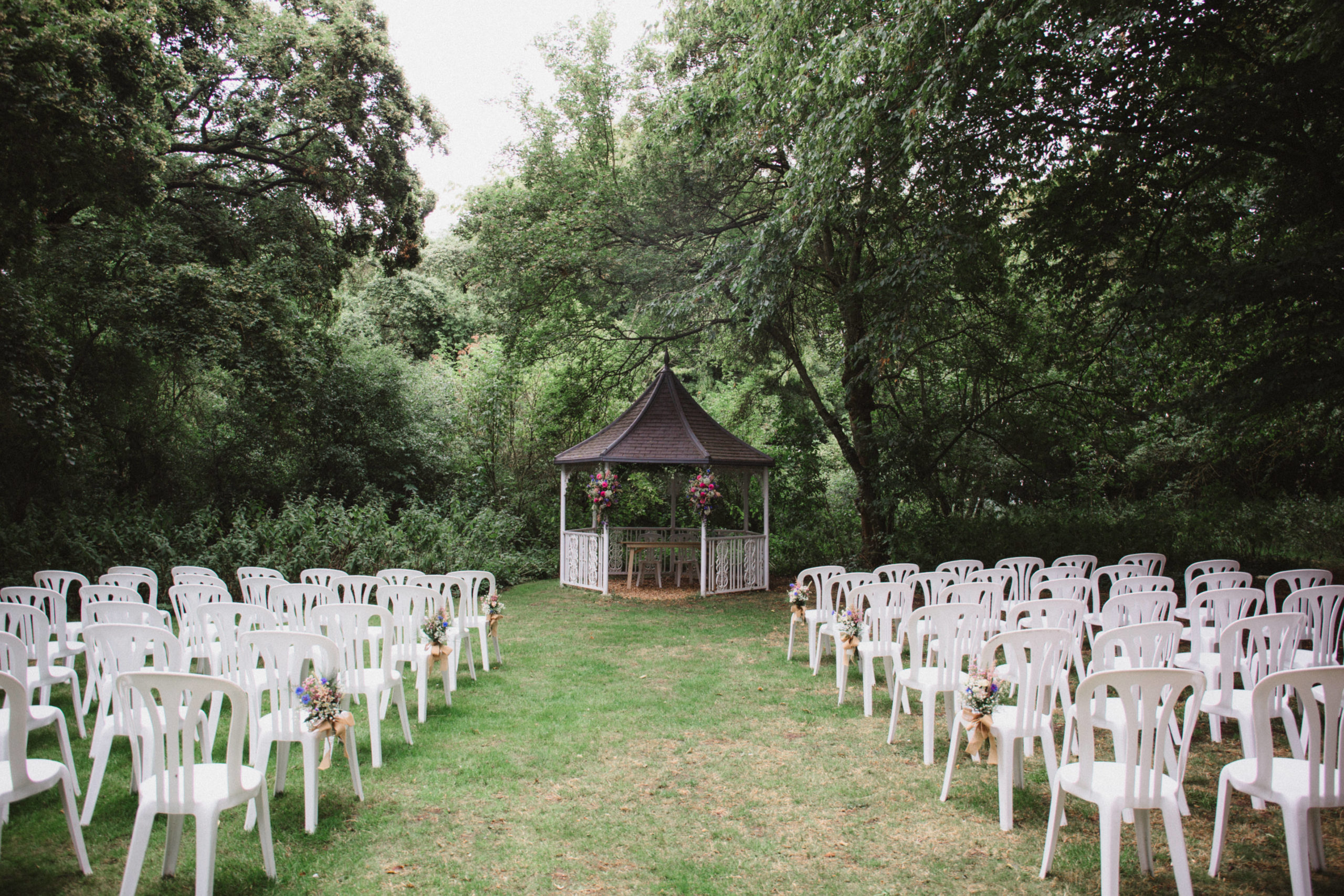 Woodland ceremony setup at Milling Barn, Bluntswood Hall, Buntingford
